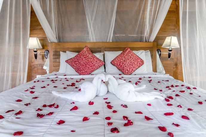 Imagen de la habitación del Hotel Sari Bamboo Bungalows. Foto 8