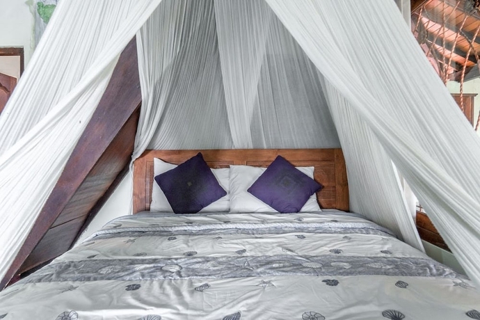 Imagen de la habitación del Hotel Sari Bamboo Bungalows. Foto 10