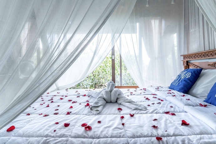 Imagen de la habitación del Hotel Sari Bamboo Bungalows. Foto 11