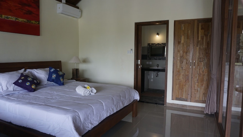 Imagen de la habitación del Hotel Sari Bamboo Bungalows. Foto 12