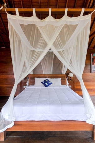 Imagen de la habitación del Hotel Sari Bamboo Bungalows. Foto 14