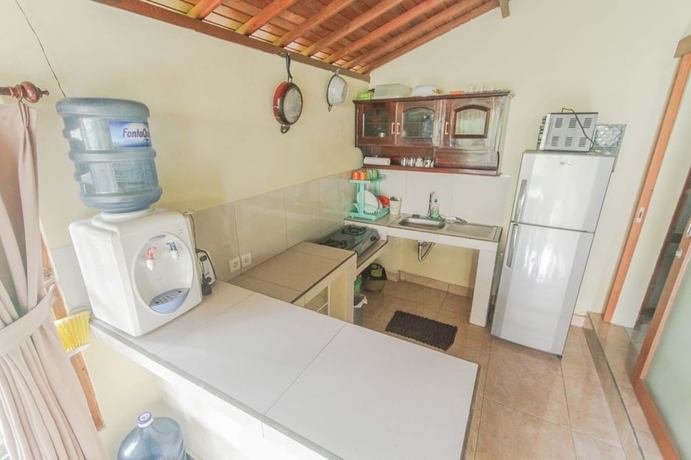 Imagen de la habitación del Hotel Sari Bamboo Bungalows. Foto 18