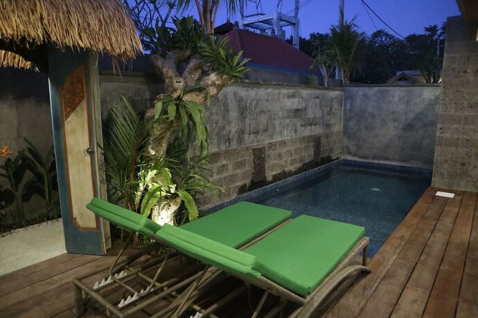 Imagen de la habitación del Hotel Sari Dana Villas. Foto 27