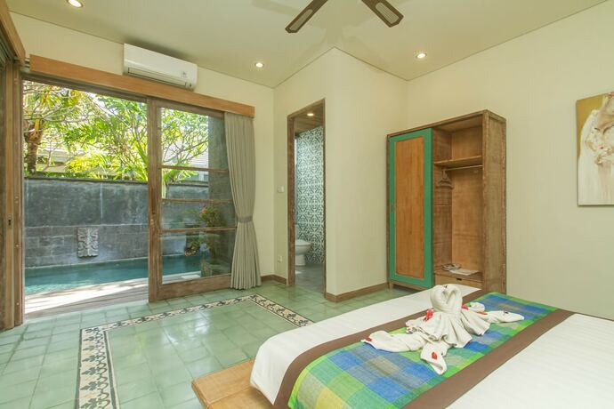 Imagen de la habitación del Hotel Sari Dana Villas. Foto 29