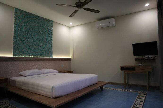 Imagen de la habitación del Hotel Sari Dana Villas. Foto 38