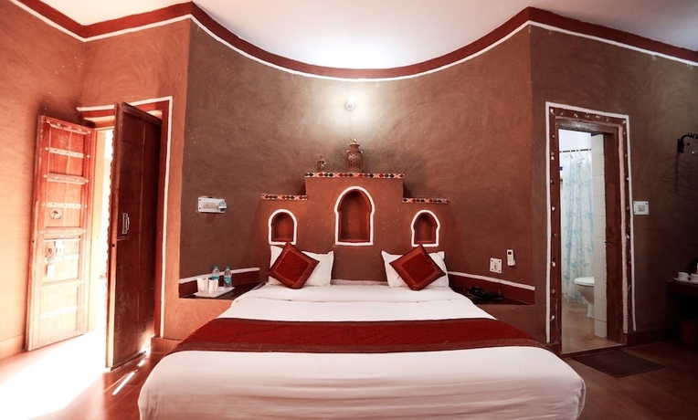 Imagen de la habitación del Hotel Sariska Tiger Camp Resort. Foto 15