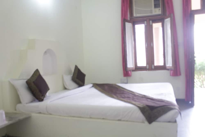 Imagen de la habitación del Hotel Sariska Tiger Camp Resort. Foto 16