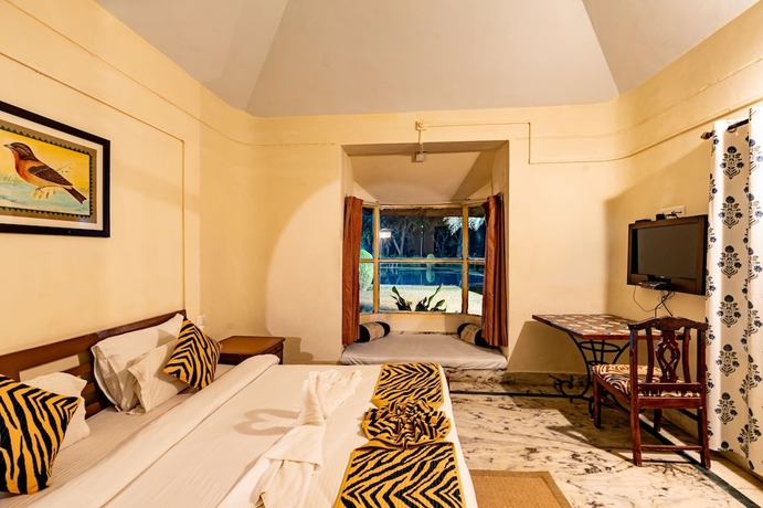 Imagen de la habitación del Hotel Sariska Tiger Heaven Resort. Foto 7