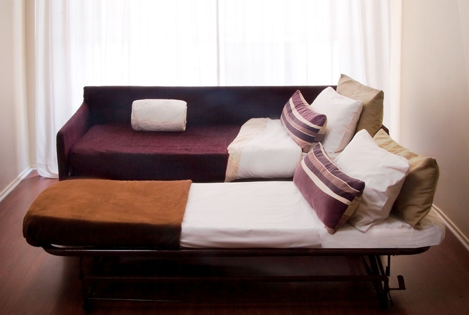 Imagen de la habitación del Hotel Sarmiento Suites. Foto 5