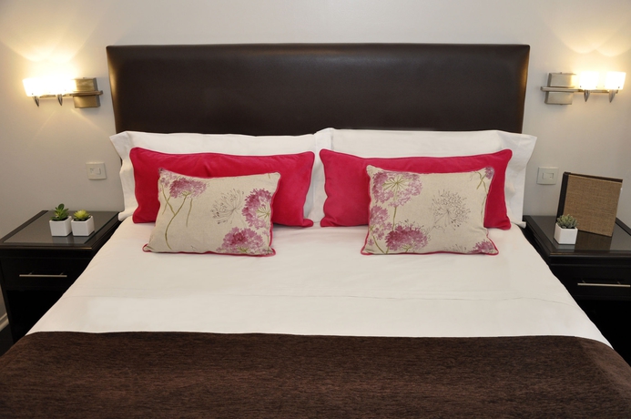 Imagen de la habitación del Hotel Sarmiento Suites. Foto 6