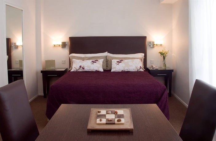 Imagen de la habitación del Hotel Sarmiento Suites. Foto 10