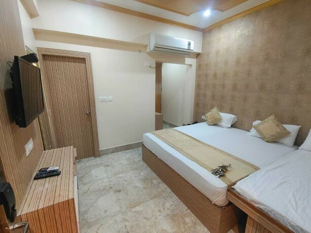 Imagen de la habitación del Hotel Sarnath International. Foto 7