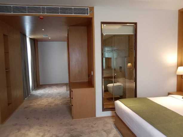 Imagen de la habitación del Hotel Sarovar Portico Sonipat. Foto 3