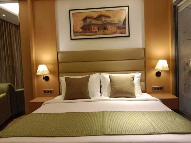 Imagen de la habitación del Hotel Sarovar Portico Sonipat. Foto 7