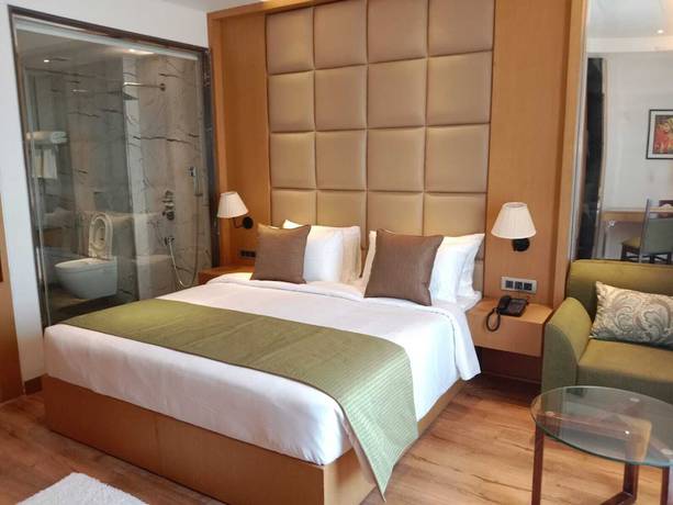 Imagen de la habitación del Hotel Sarovar Portico Sonipat. Foto 8