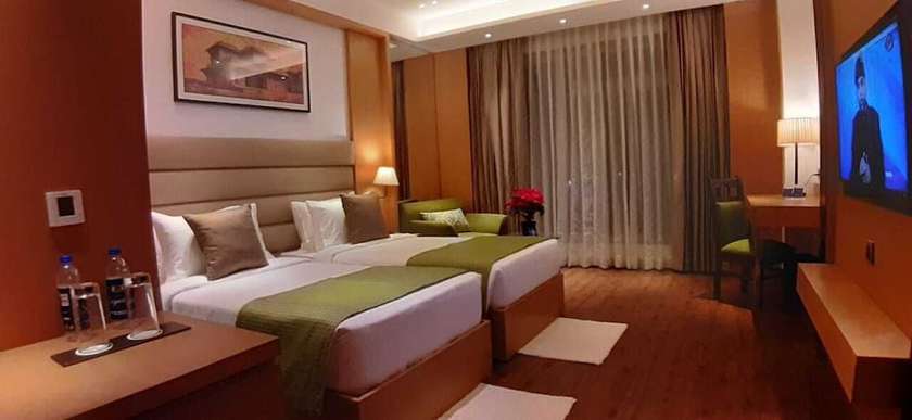 Imagen de la habitación del Hotel Sarovar Portico Sonipat. Foto 9