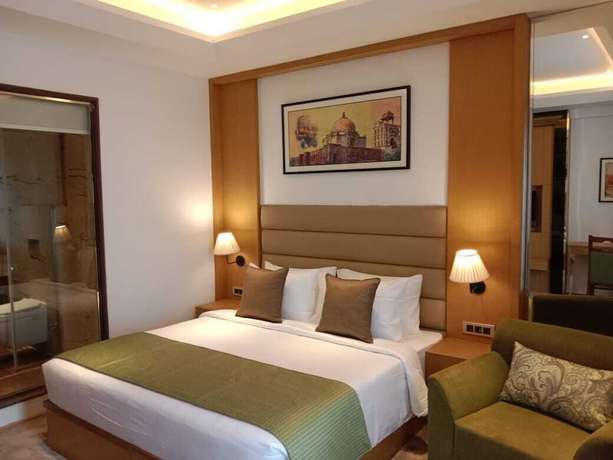 Imagen de la habitación del Hotel Sarovar Portico Sonipat. Foto 14