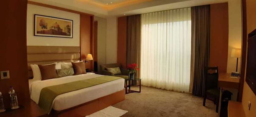 Imagen de la habitación del Hotel Sarovar Portico Sonipat. Foto 15