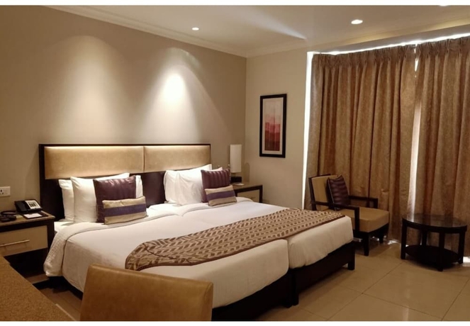 Imagen de la habitación del Hotel Sarovar Portico Surajkund Faridabad. Foto 6