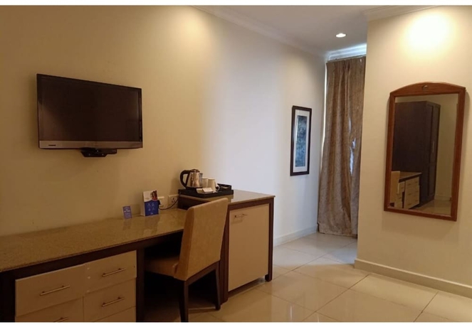 Imagen de la habitación del Hotel Sarovar Portico Surajkund Faridabad. Foto 7
