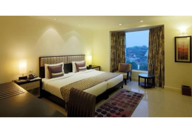Imagen de la habitación del Hotel Sarovar Portico Surajkund Faridabad. Foto 8