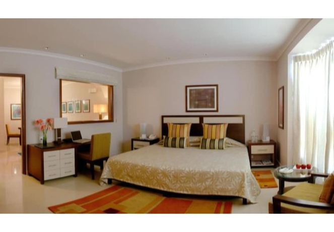 Imagen de la habitación del Hotel Sarovar Portico Surajkund Faridabad. Foto 10