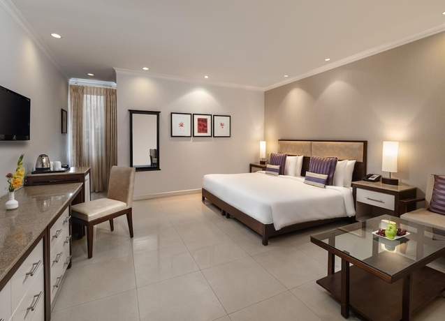 Imagen de la habitación del Hotel Sarovar Portico Surajkund Faridabad. Foto 12