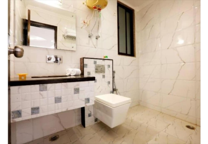 Imagen de la habitación del Hotel Sarovar Portico Surajkund Faridabad. Foto 16