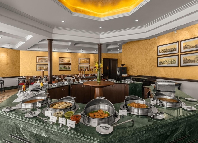 Imagen del bar/restaurante del Hotel Sarovar Portico Surajkund Faridabad. Foto 3