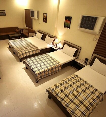 Imagen de la habitación del Hotel Sarovar Regency. Foto 18