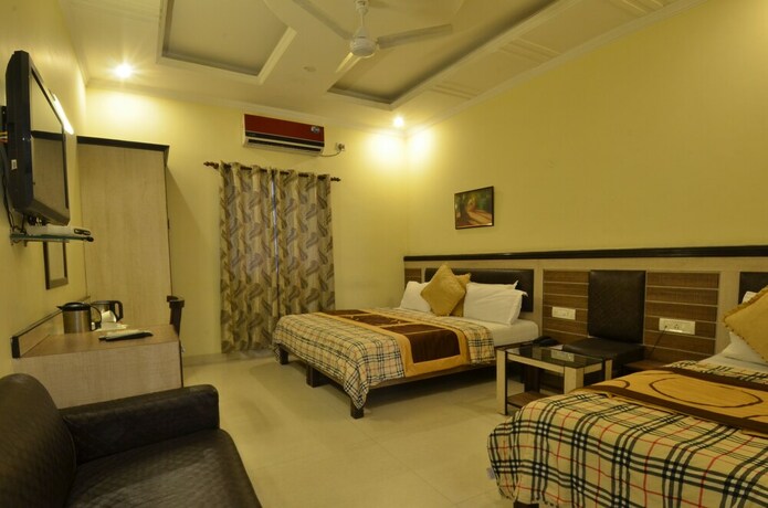 Imagen de la habitación del Hotel Sarovar Regency. Foto 23