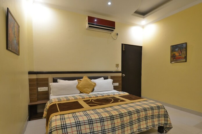 Imagen de la habitación del Hotel Sarovar Regency. Foto 26