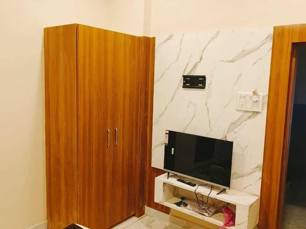 Imagen de la habitación del Hotel Sarthak Palace. Foto 7