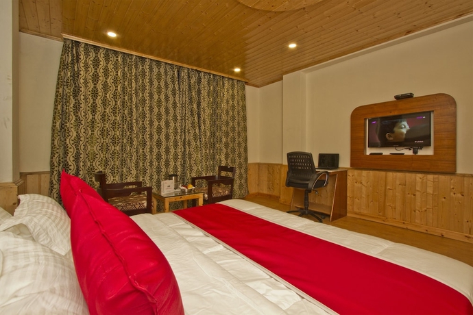 Imagen de la habitación del Hotel Sarthak Regency. Foto 11