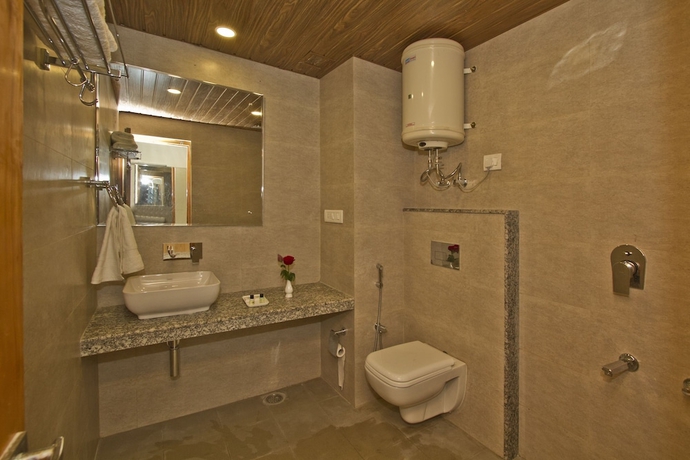 Imagen de la habitación del Hotel Sarthak Regency. Foto 15