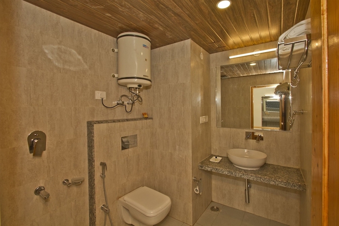 Imagen de la habitación del Hotel Sarthak Regency. Foto 16