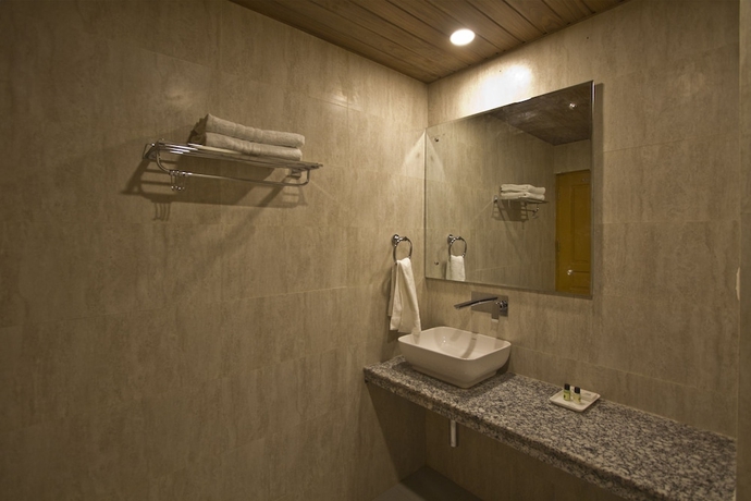 Imagen de la habitación del Hotel Sarthak Regency. Foto 18
