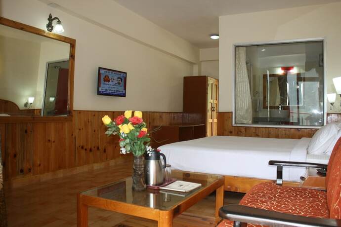 Imagen de la habitación del Hotel Sarthak Resorts. Foto 17
