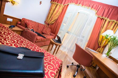 Imagen de la habitación del Hotel Sartori's. Foto 7