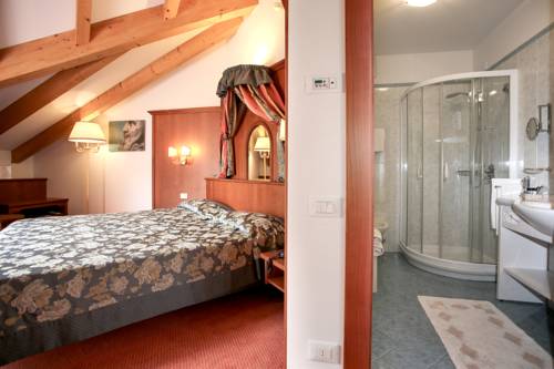 Imagen de la habitación del Hotel Sartori's. Foto 8