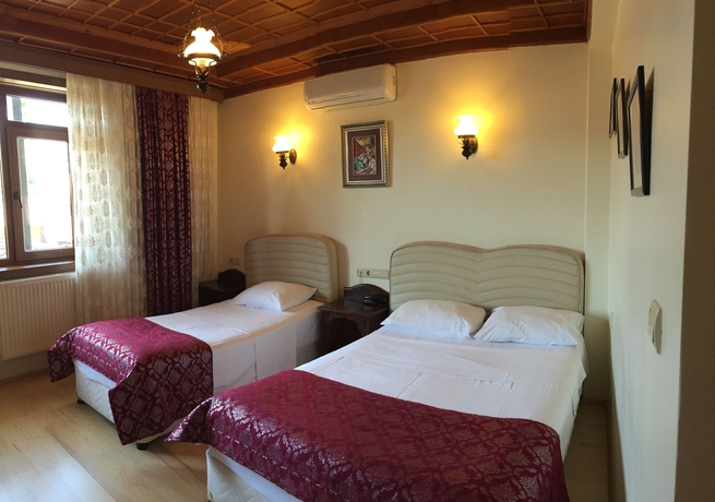 Imagen de la habitación del Hotel Saruhan. Foto 9