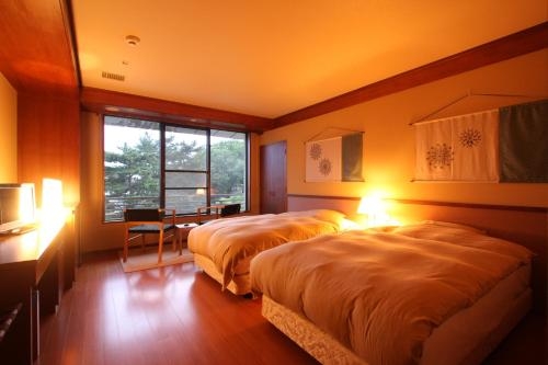 Imagen de la habitación del Hotel Sarusawaike Yoshidaya. Foto 7