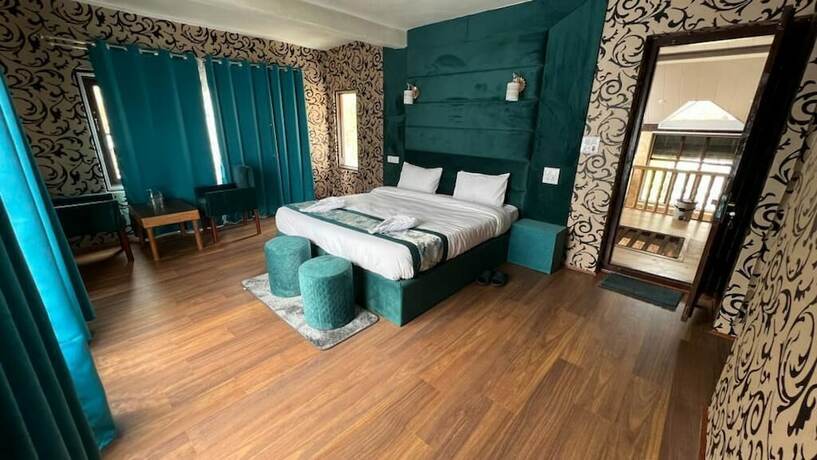 Imagen de la habitación del Hotel Sarwa Cottage. Foto 16