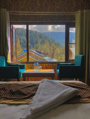 Imagen de la habitación del Hotel Sarwa Cottage. Foto 28