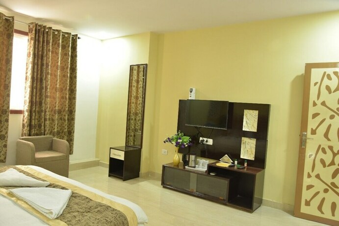Imagen de la habitación del Hotel Sarweshwary. Foto 18