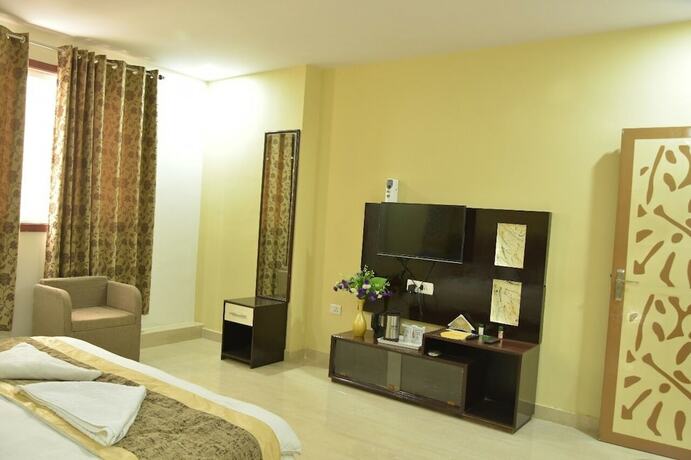 Imagen de la habitación del Hotel Sarweshwary. Foto 19