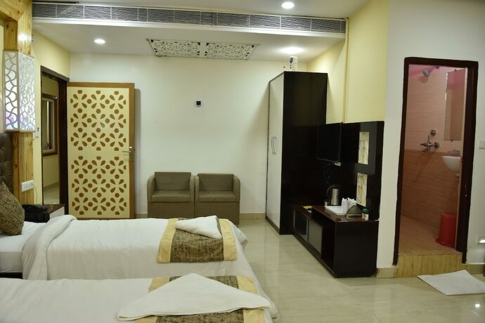 Imagen de la habitación del Hotel Sarweshwary. Foto 25