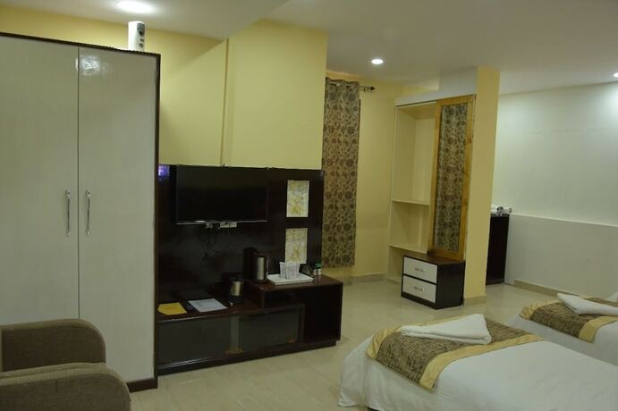Imagen de la habitación del Hotel Sarweshwary. Foto 32