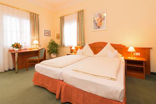 Imagen de la habitación del Hotel Sascha's Kachelofen. Foto 8