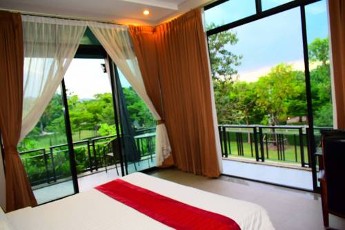 Imagen de la habitación del Hotel Sasima Moonlight Villa. Foto 3